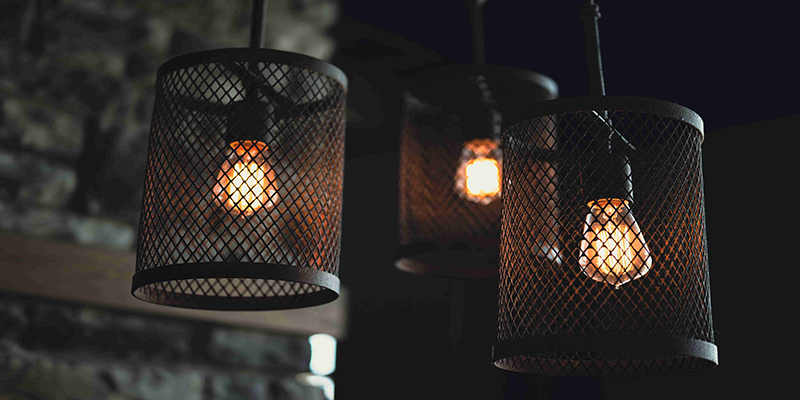 industrial mesh pendant lights, vintage-style warm bulb lighting