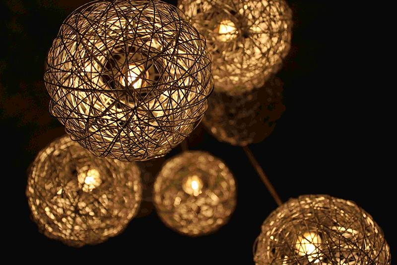 golden wire pendant lights, modern decorative lighting design with warm glow