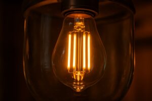 LED filament bulb glowing in clear glass