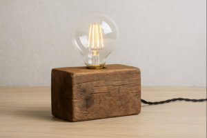 A simple lamp made from a block of reclaimed wood and a large G95 globe bulb